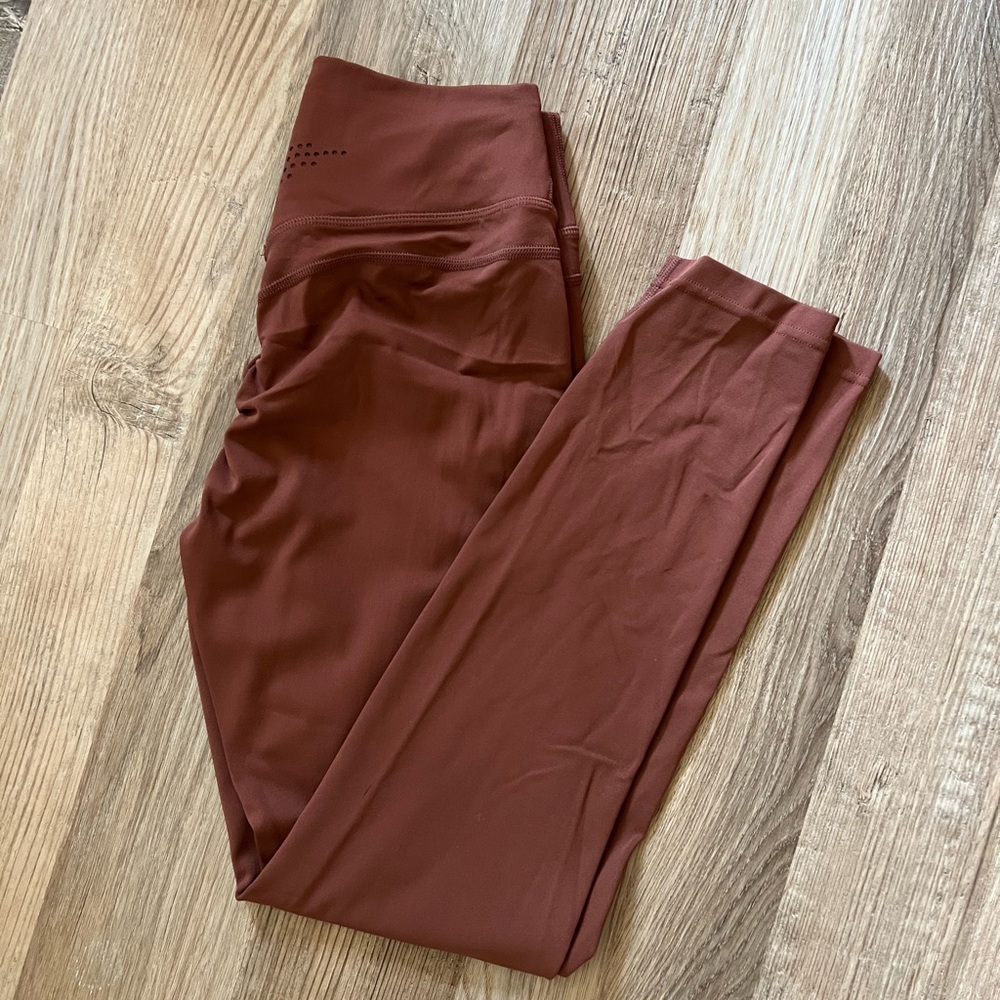 Rusty red high waisted workout leggings.